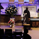 A mourner pays respects before the start of the funeral service for Atatiana Jefferson on October 24, 2019, at Concord Church in Dallas, Texas.